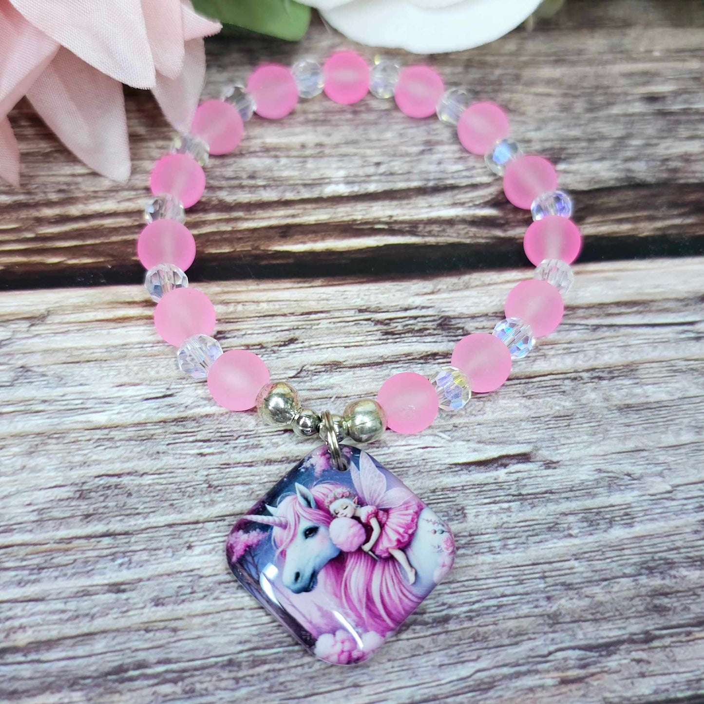 16 cm pink unicorn and fairy charm bracelet (12a)