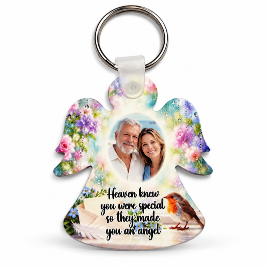 Personalised memorial angel photo keyring featuring a robin, white feather, letter, floral artwork and remembrance wording