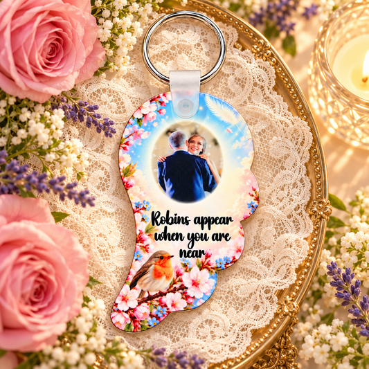 Robin memorial photo angel wing keyring displayed on a gold tray with lace, pink roses, lavender and candlelight
