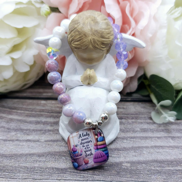 16cm A lady never discusses the size of her yarn stash Handmade Beaded Bracelet with Unique Charm – Glass or Gemstone Beads  (147)